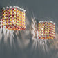 Aurea 10 A1 væglampe med en kombination af amber, rosso og tranperente krystaller
