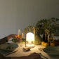 hygge ved bordet med FollowMe LED bordlampe fra Marset designer Inma Bermúdez, 2014